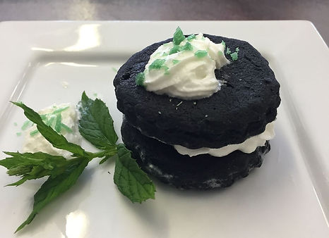 Welsh cake Served with fresh cream and decorated in with mint